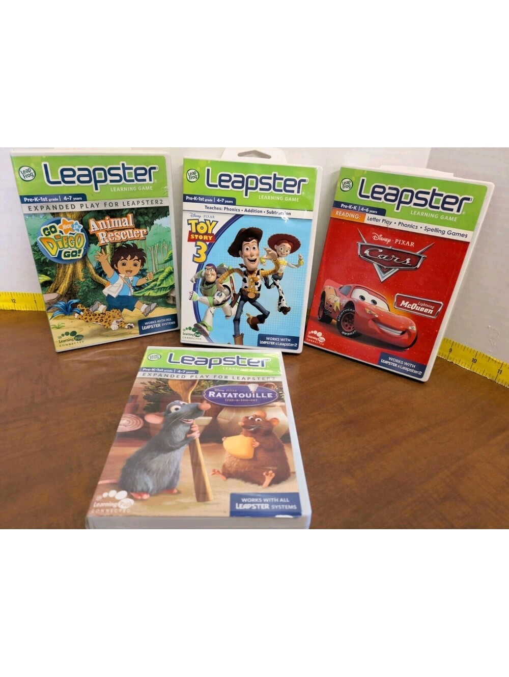 LeapFrog Leapster- 4 Game Bundle Cars Go Diego Go Toy Story 3 Ratatouille